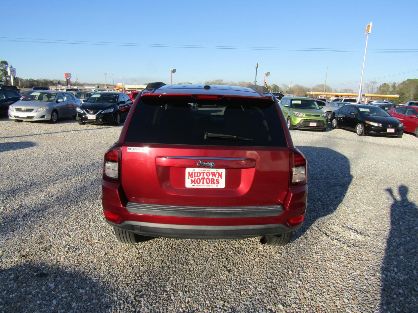 2016 Red /Gray Jeep Compass Sport FWD (1C4NJCBA3GD) with an 2.0L L4 DOHC 16V engine, Automatic transmission, located at 15016 S Hwy 231, Midland City, AL, 36350, (334) 983-3001, 31.306210, -85.495277 - Photo#6